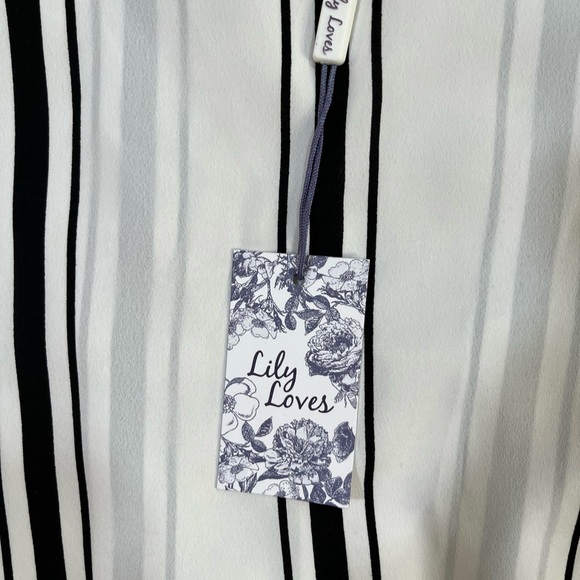 Asymmetrical tunic - Picture 2 of 3